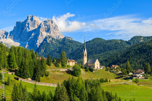 Church in alpine village of Pian, Dolomiti Mountains, Italy photo