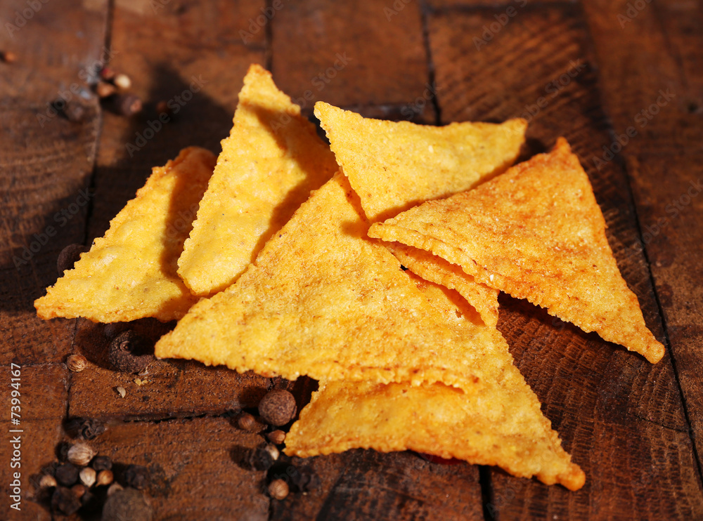 Tasty nachos on wooden background Tasty nachos on wooden background