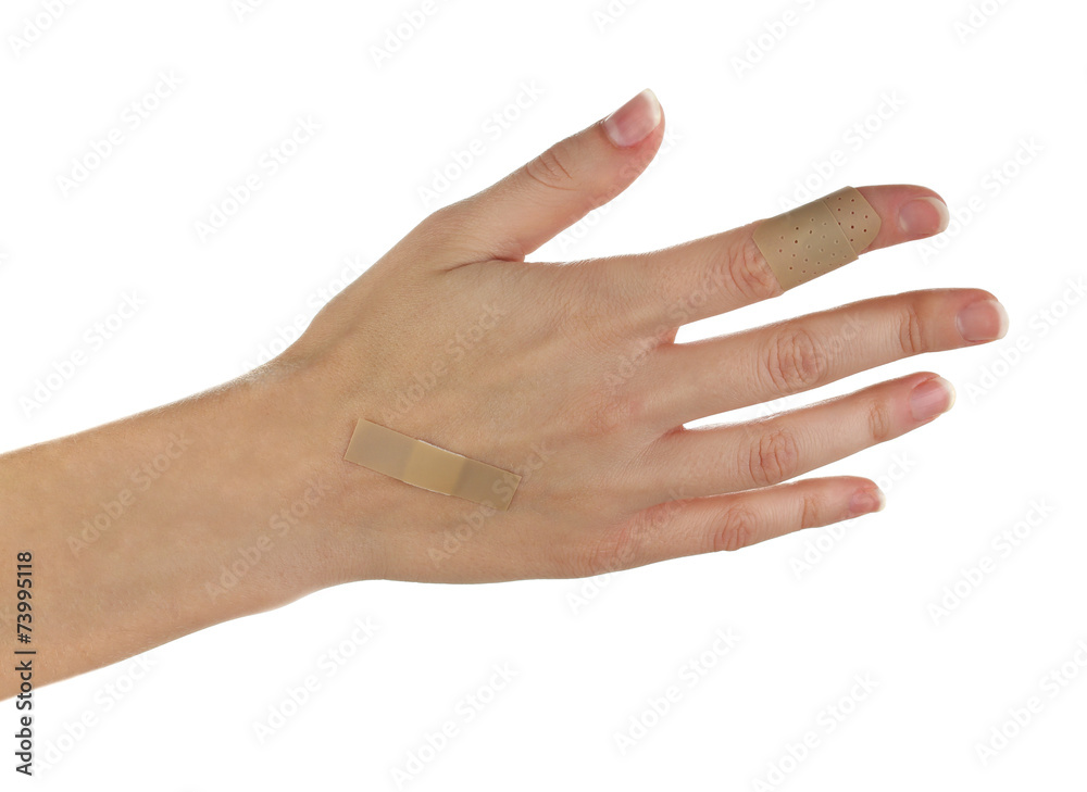 Wounded hand with plaster isolated on white Wounded hand with plaster isolated on white