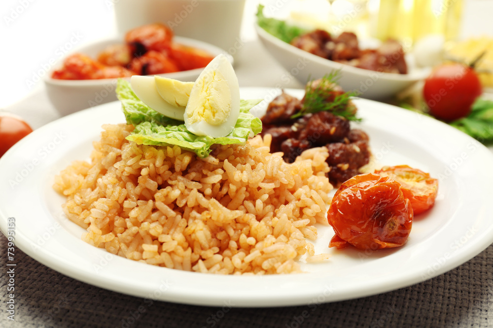 Tasty rice served on table, close-up Tasty rice served on table, close-up