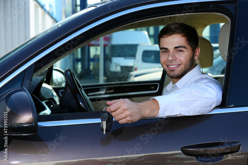 Young man in car