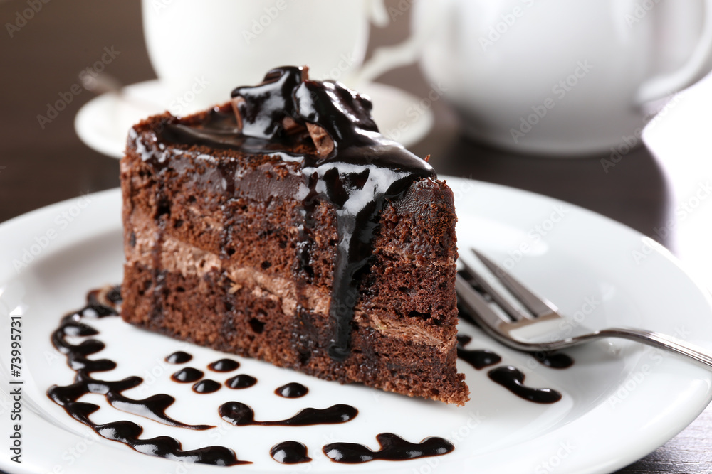 Yummy chocolate cake served on table, close-up Yummy chocolate cake served on table, close-up