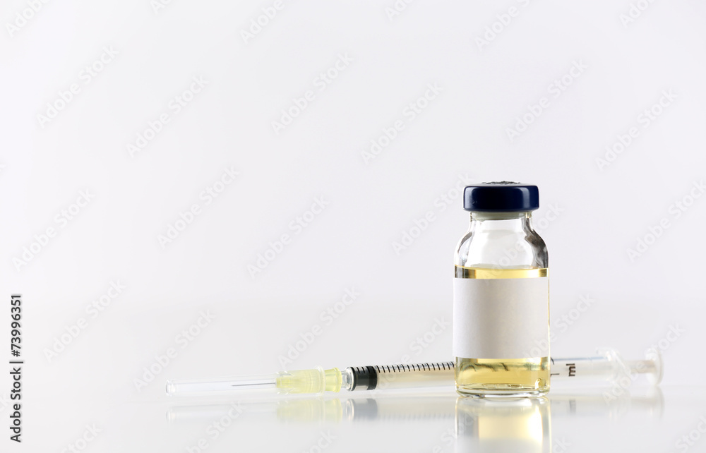 Vaccine in vial with syringe Vaccine in vial with syringe