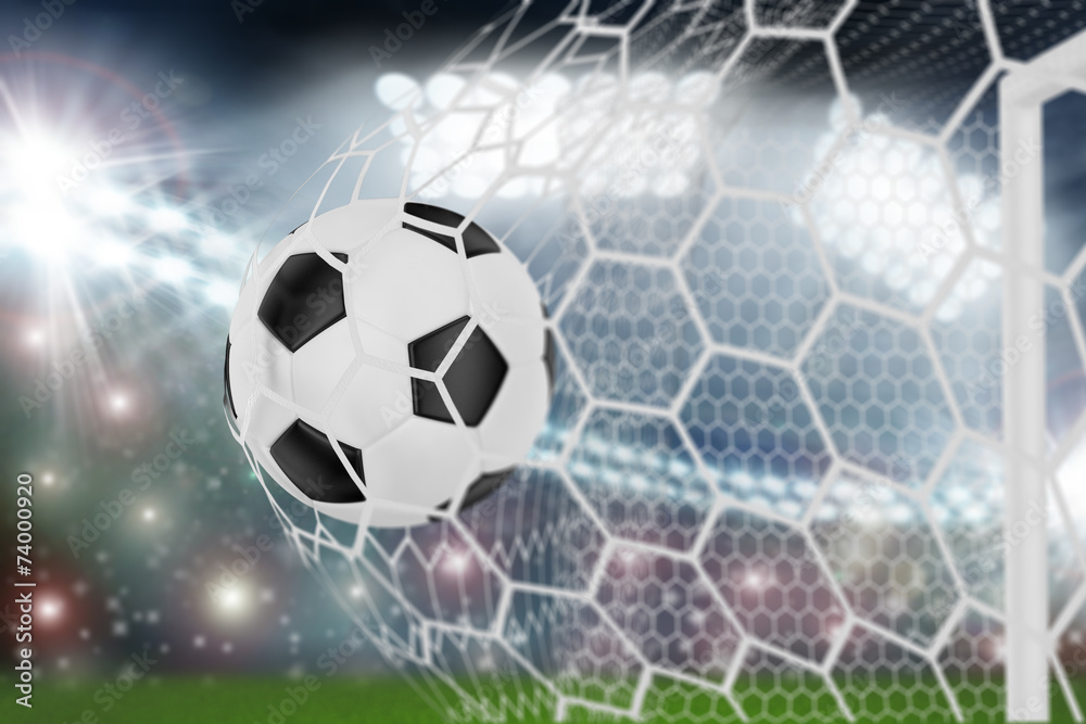 Fototapeta premium soccer ball in goal net