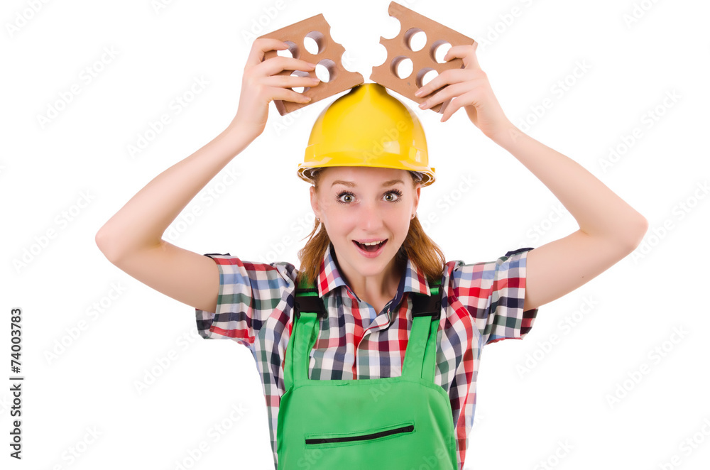 Woman with bricks isolated on white