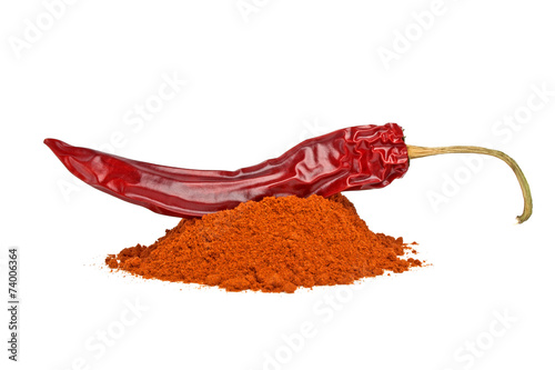 Red pepper with its powder on a white background