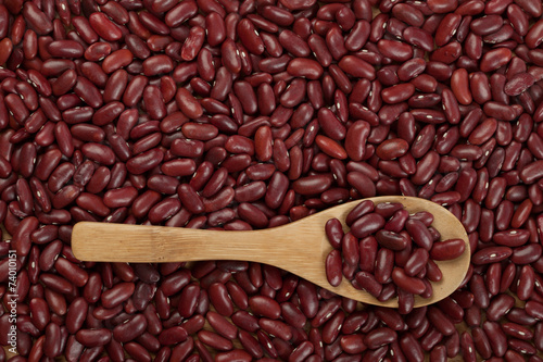 Red kidney beans with wooden spoon