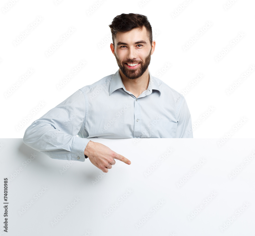 A young bearded man showing blank signboard, isolated over white