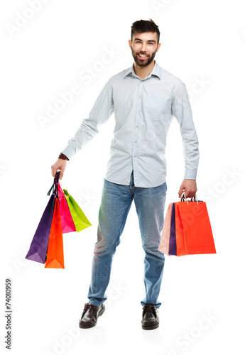 Man holding shopping bags. Christmas and holidays concept