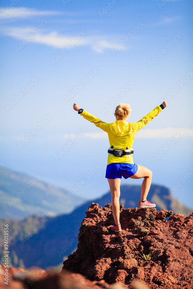 Climbing success, woman cross country runner Climbing success, woman cross country runner