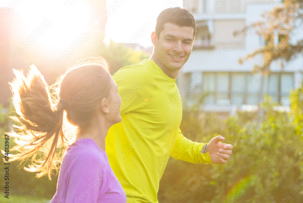Naklejka premium Young couple jogging