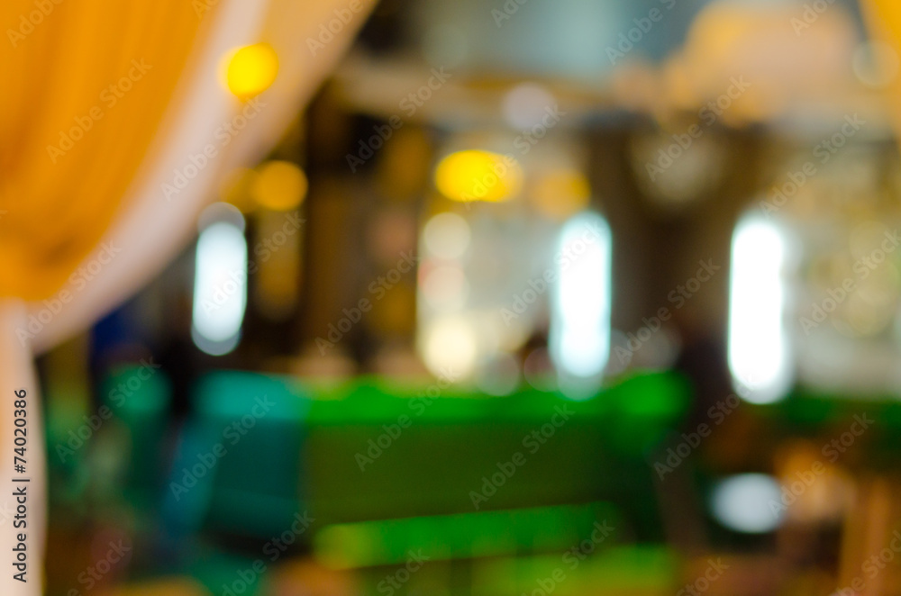 Blurred interior of a location for food and drinks