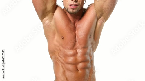 Muscular and sexy torso of young man, bodybulider isolatedon photo