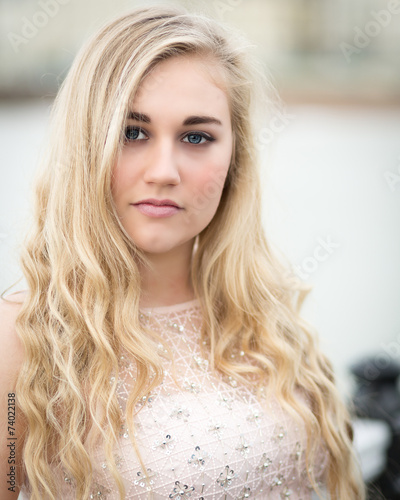Beautiful Blond Teenage Girl With Blue Eyes