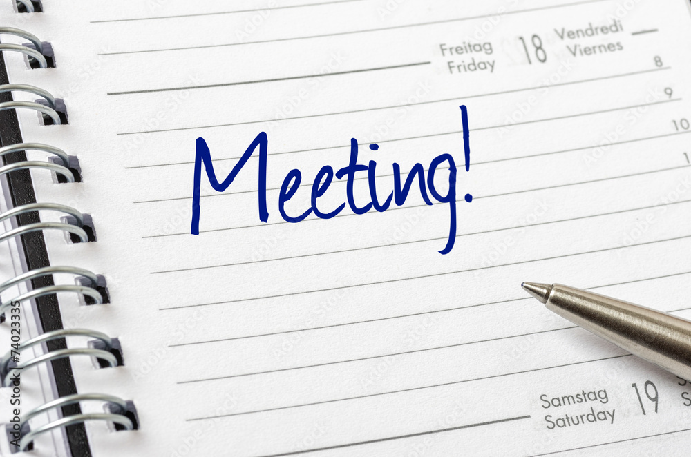 Terminkalender mit dem Eintrag Meeting Terminkalender mit dem Eintrag Meeting