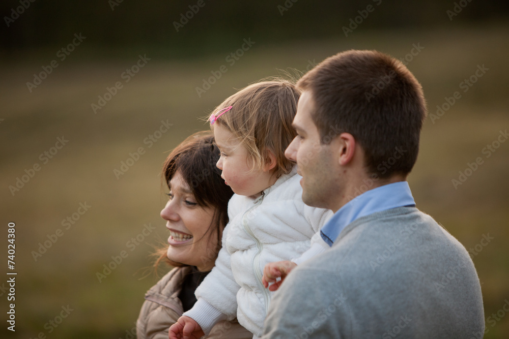 Mother Father and their little daughter Mother Father and their little daughter