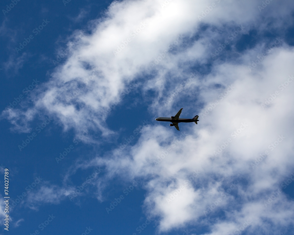 Silhouette of airplane in the sky