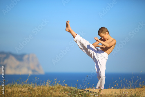 boy karate on the coast © komi$ar