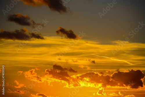 yellow and orange sky at sunset
