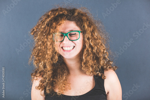 Smiling Curly Young Woman Portrait