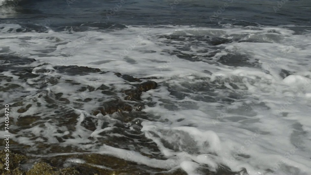 Small surf at the silent sea Small surf at the silent sea