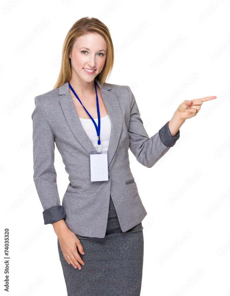 Businesswoman with finger point aside Businesswoman with finger point aside