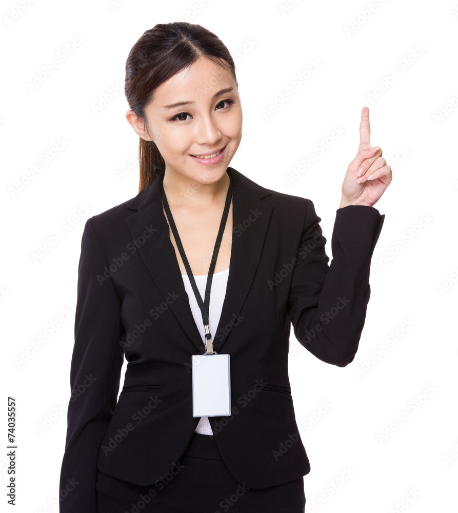 Businesswoman with staff card and finger point up Businesswoman with staff card and finger point up
