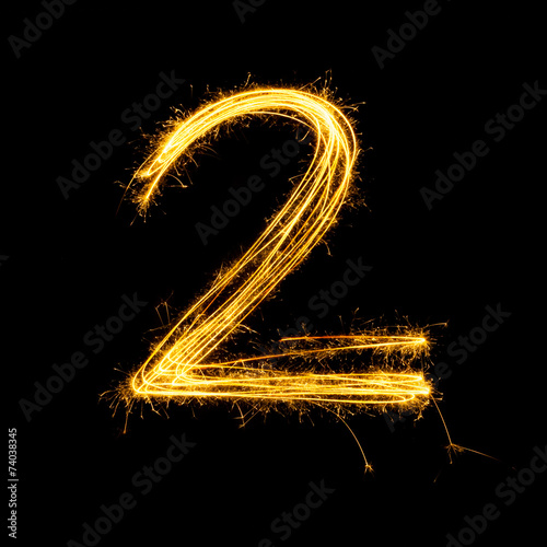 Sparkler firework light alphabet number 2.