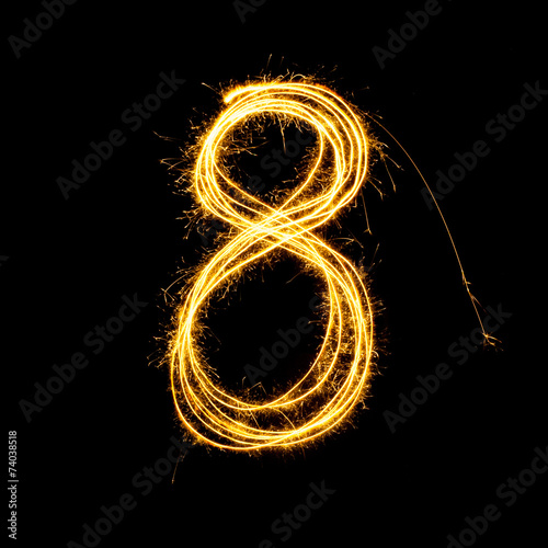 Sparkler firework light alphabet number 8.