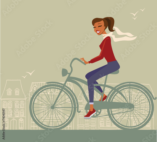 Girl cycling in the city