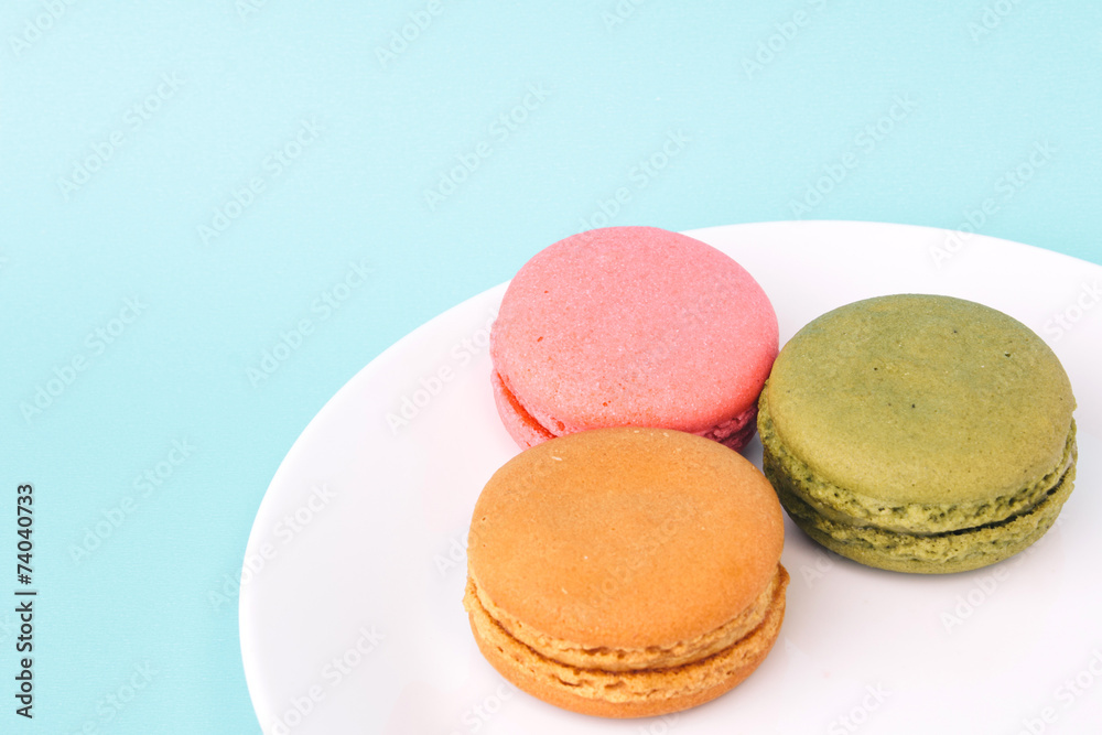 Tasty colorful macaroon on a plate Tasty colorful macaroon on a plate