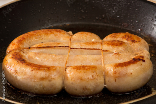 Chicken sausage in a frying pan