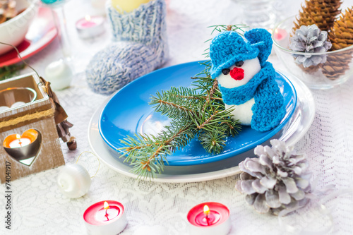 Christmas festive xmas eve table board setting New Year snowman photo