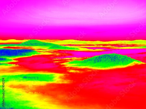 Fantastic infrared scan of rocky landscape, forest, colorful fog