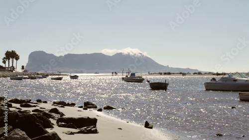 The Rock of Gibraltar and seaside in Palmones, Spain.