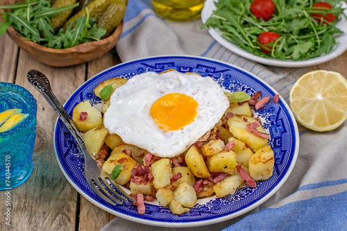 Roasted potatoes with bacon and eggs