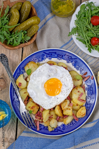 Roasted potatoes with bacon and eggs