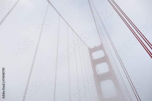 Fototapeta Naklejka Na Ścianę i Meble -  Golden Gate Bridge covered by fog