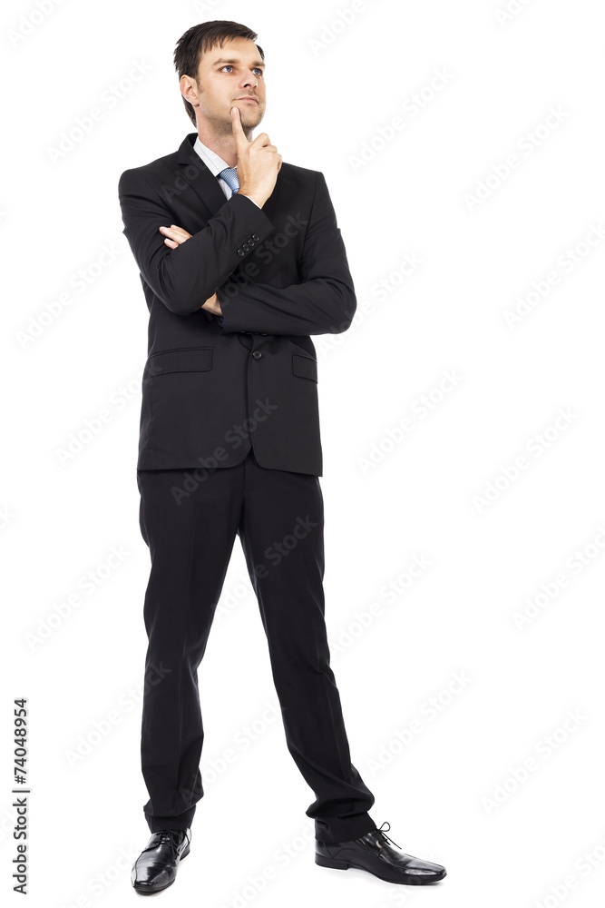 Portrait of thoughtful young business man with arms folded Portrait of thoughtful young business man with arms folded