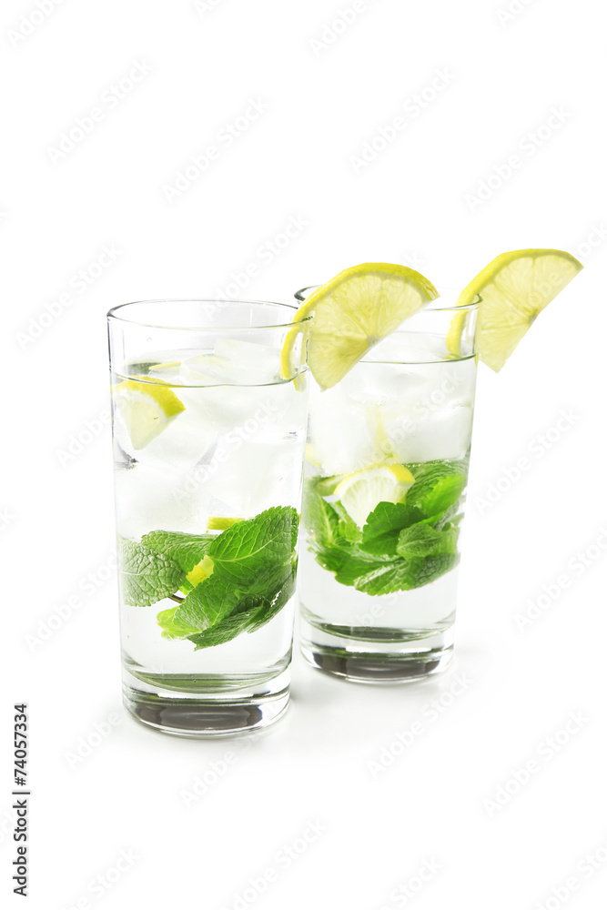 Summer cocktail with ice cubes isolated on white Summer cocktail with ice cubes isolated on white