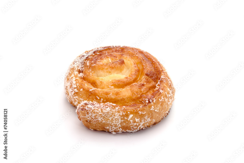 Cinnamon rolls with coconut on white background