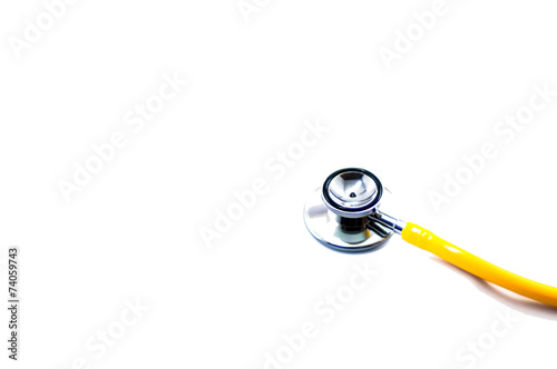 Path of yellow stethoscope in isolated background