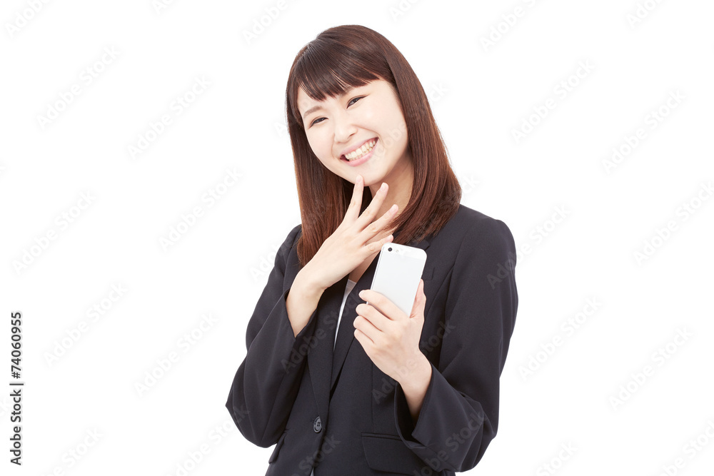 スマートフォンを持って笑うビジネスウーマン スマートフォンを持って笑うビジネスウーマン