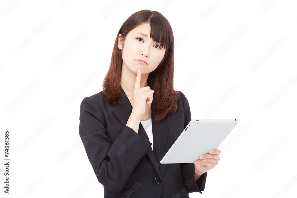 タブレットを持って考えるビジネスウーマン タブレットを持って考えるビジネスウーマン