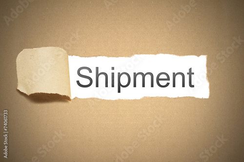 brown paper torn to reveal shipment