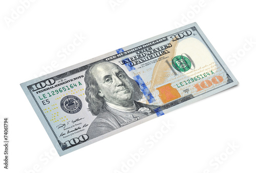 100 dollar bill closeup on white background