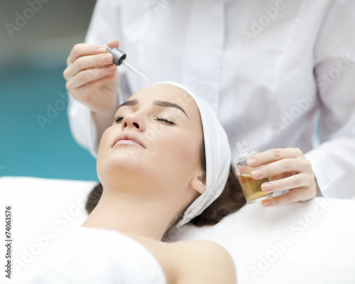 spa, resort, beauty and health concept - beautiful woman in spa 