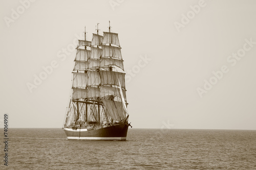 old sailing ship on the high seas photo