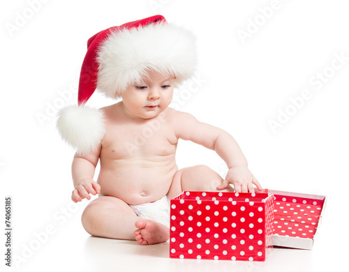 Baby in Santa hat with Chri...