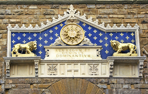 Medallion above to the entranc to Palazzo Vecchio, Florence photo